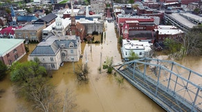 Sisters battle flooding at their generational home swallowed in Kentucky River's raging current